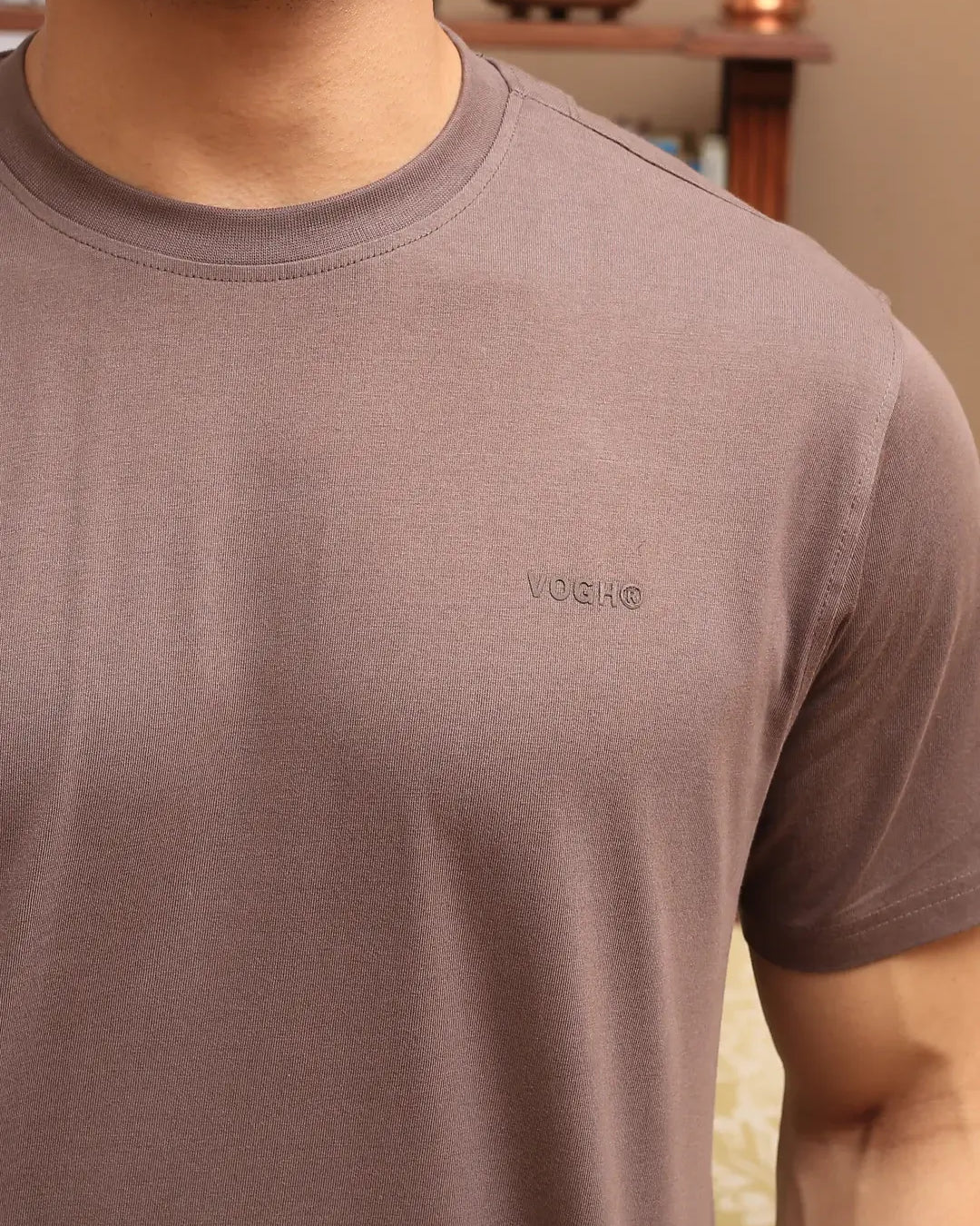 close view of brown crew neck t-shirt