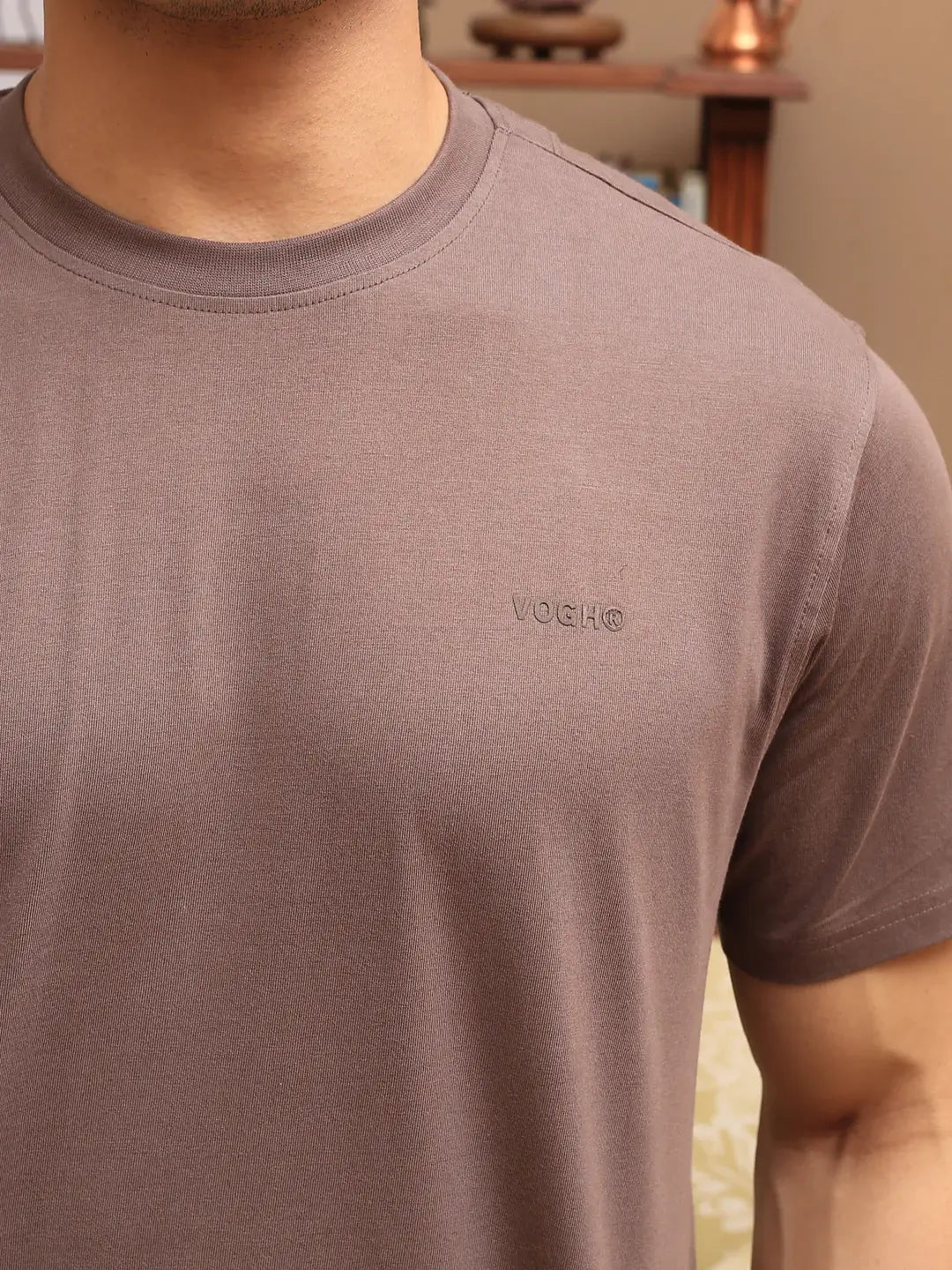 close view of brown crew neck t-shirt