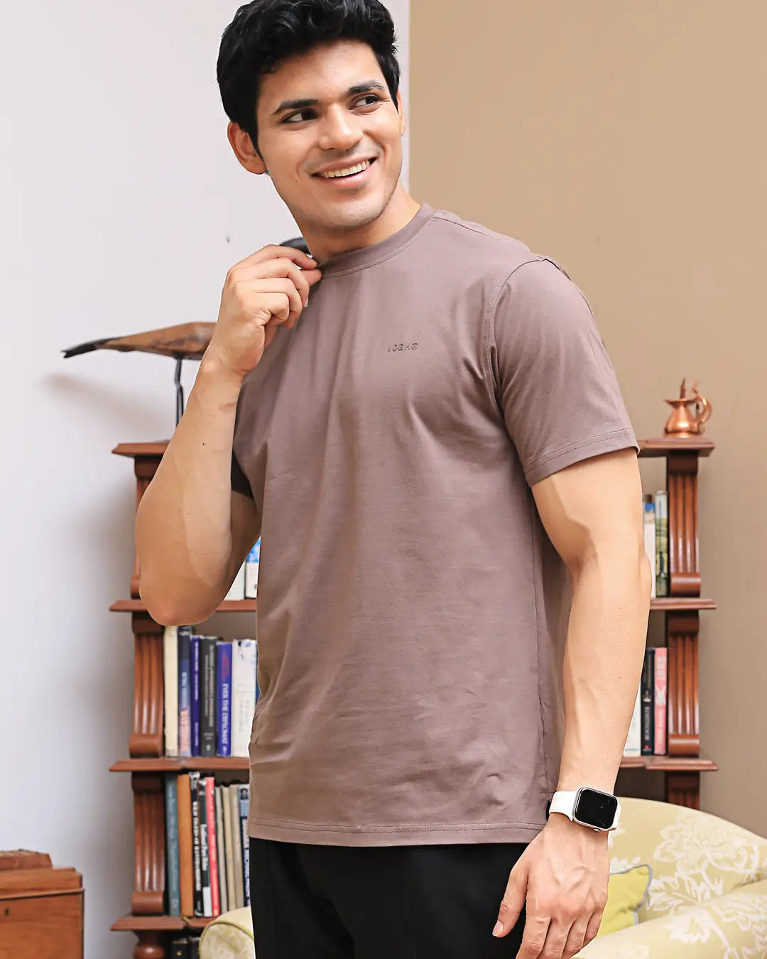 Man in brown crew neck t-shirt