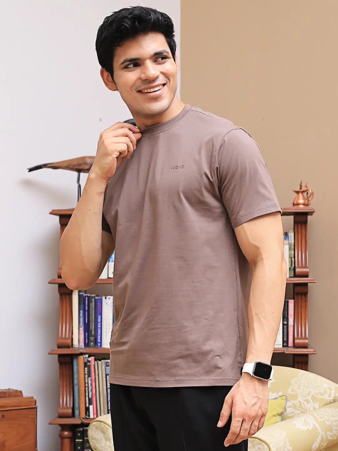 Man in brown crew neck t-shirt