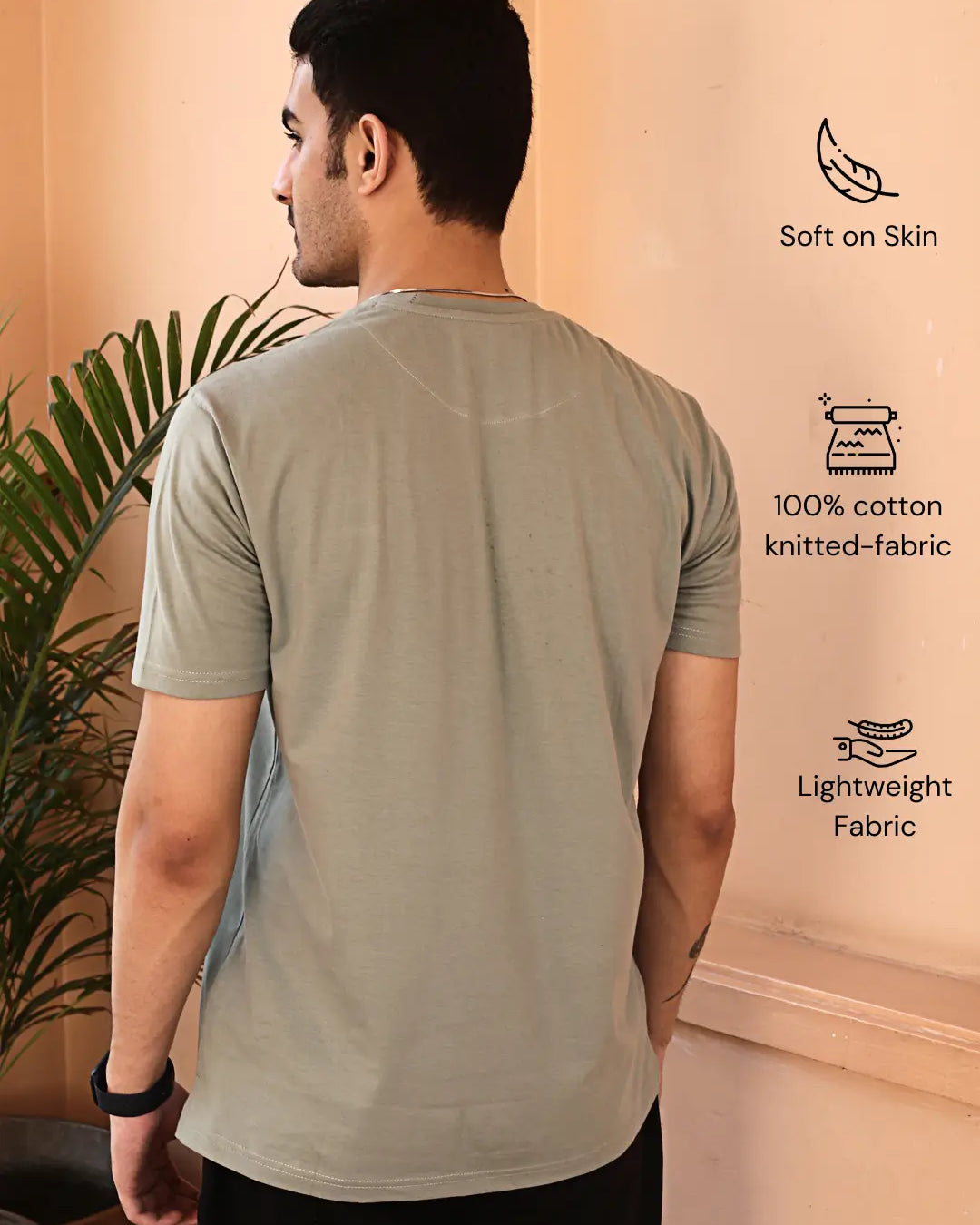 Man wearing a light gray crew neck cotton t-shirt