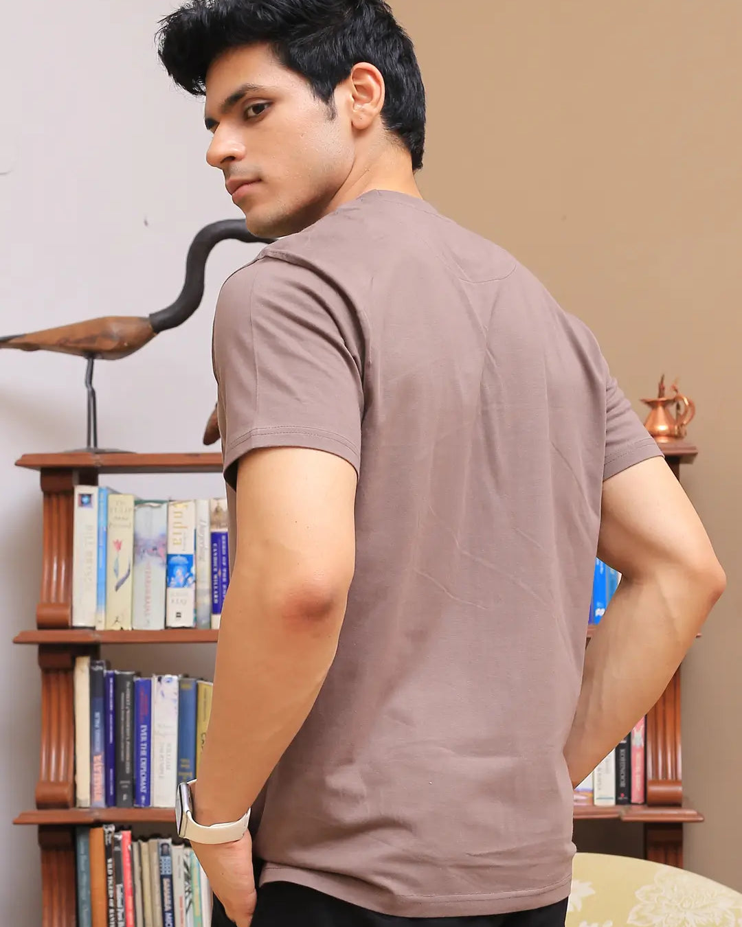 Man wearing a brown crew neck cotton t-shirt