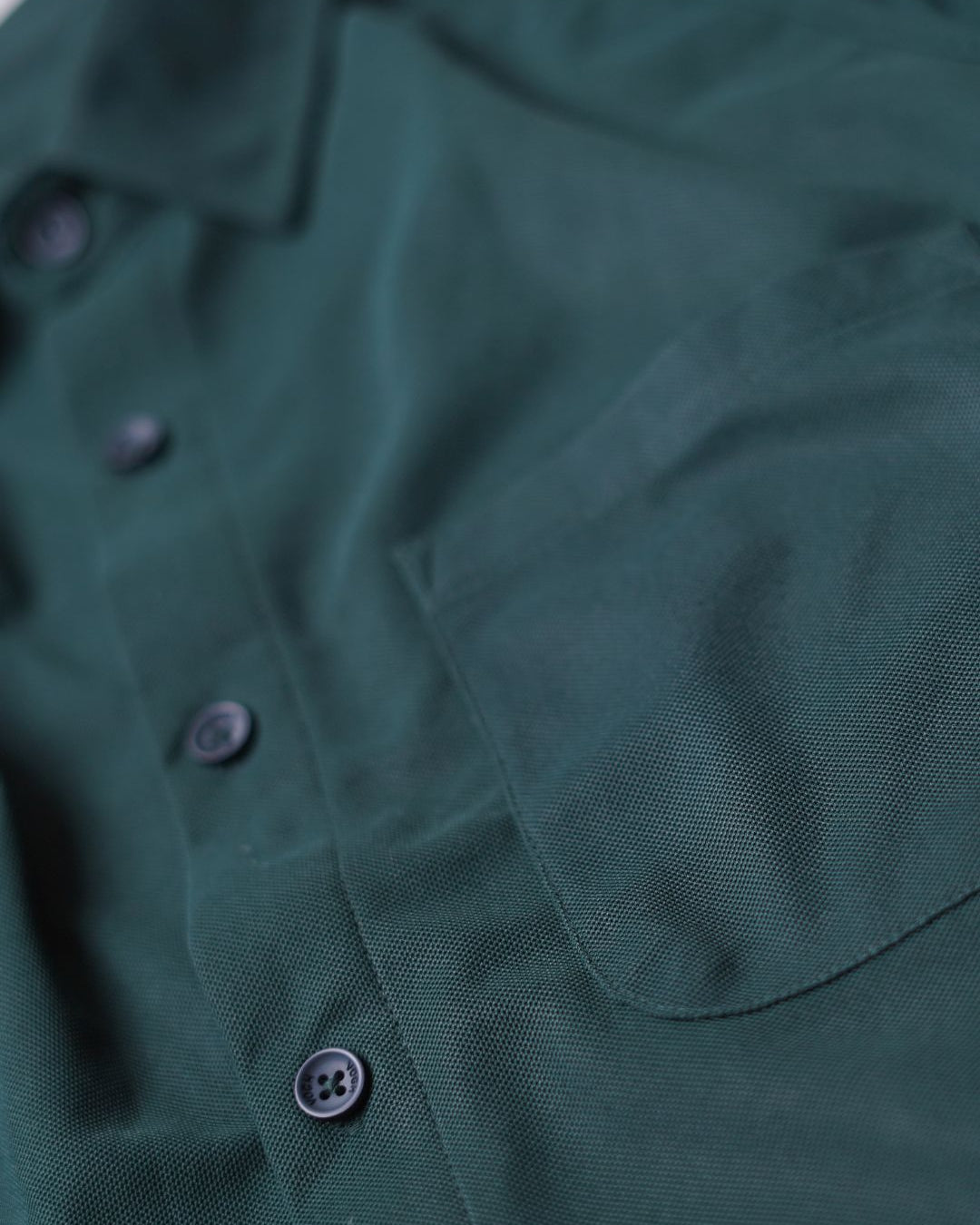 solid black blue shirt's close up