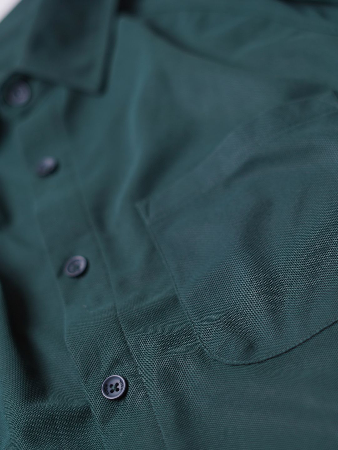 solid black blue shirt's close up