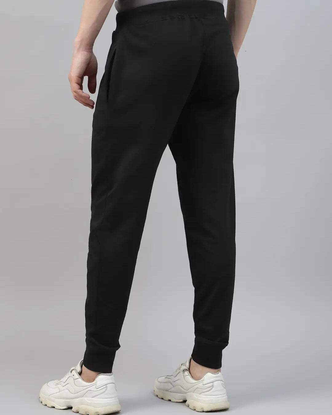 Person wearing black cotton jogger pant