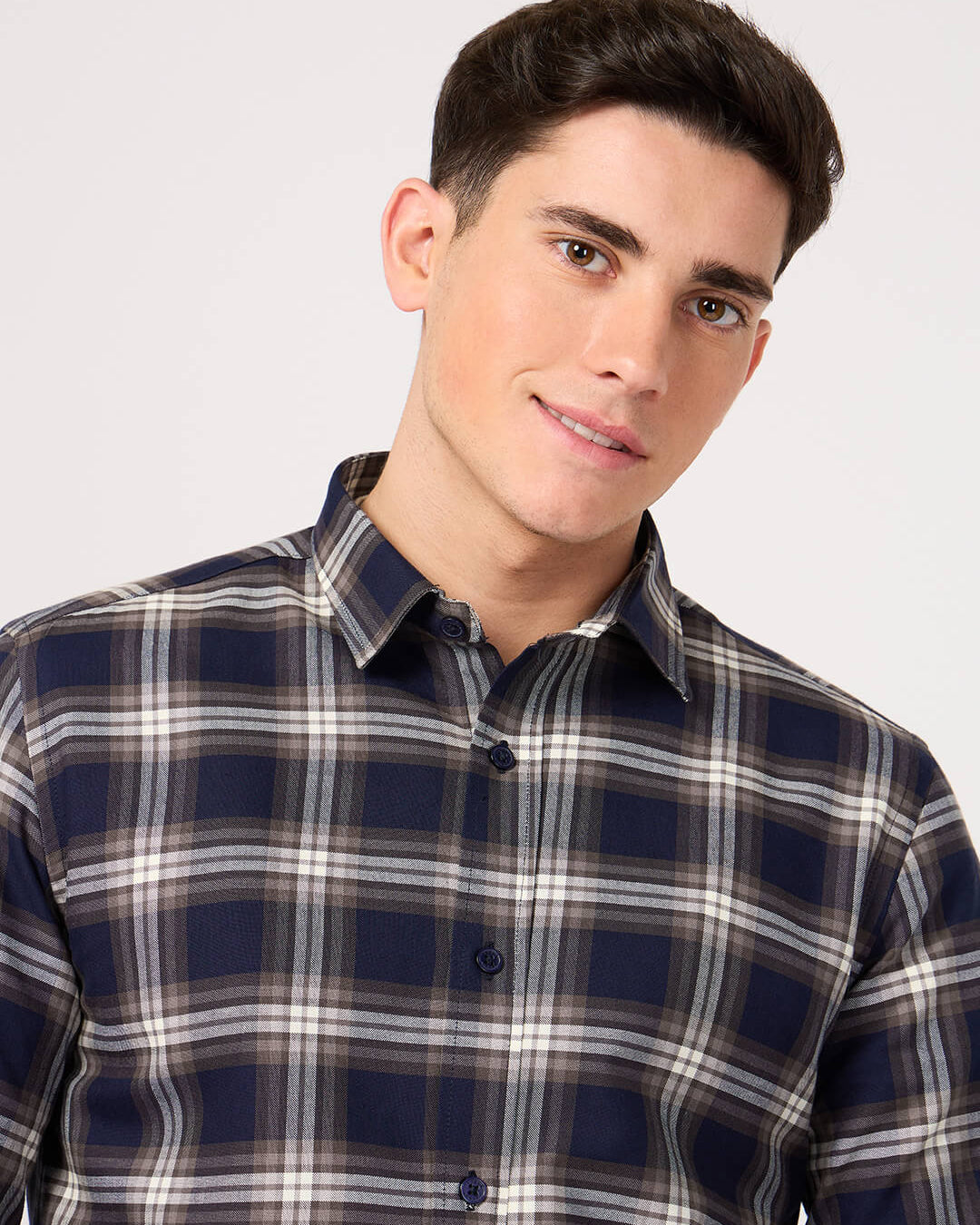 Man wearing a stylish cotton navy check shirt