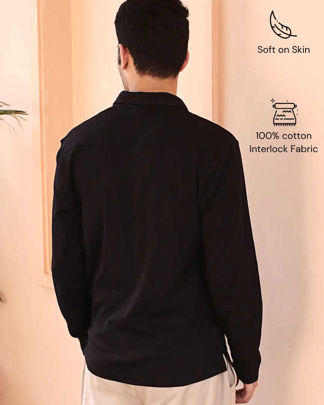 Man wearing a black cotton shirt