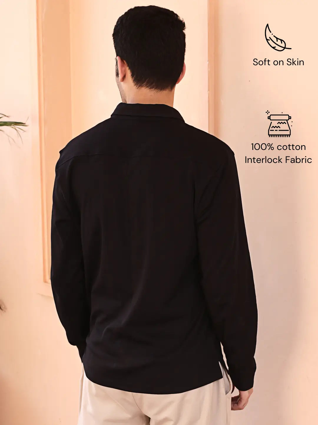 Man wearing a black cotton shirt