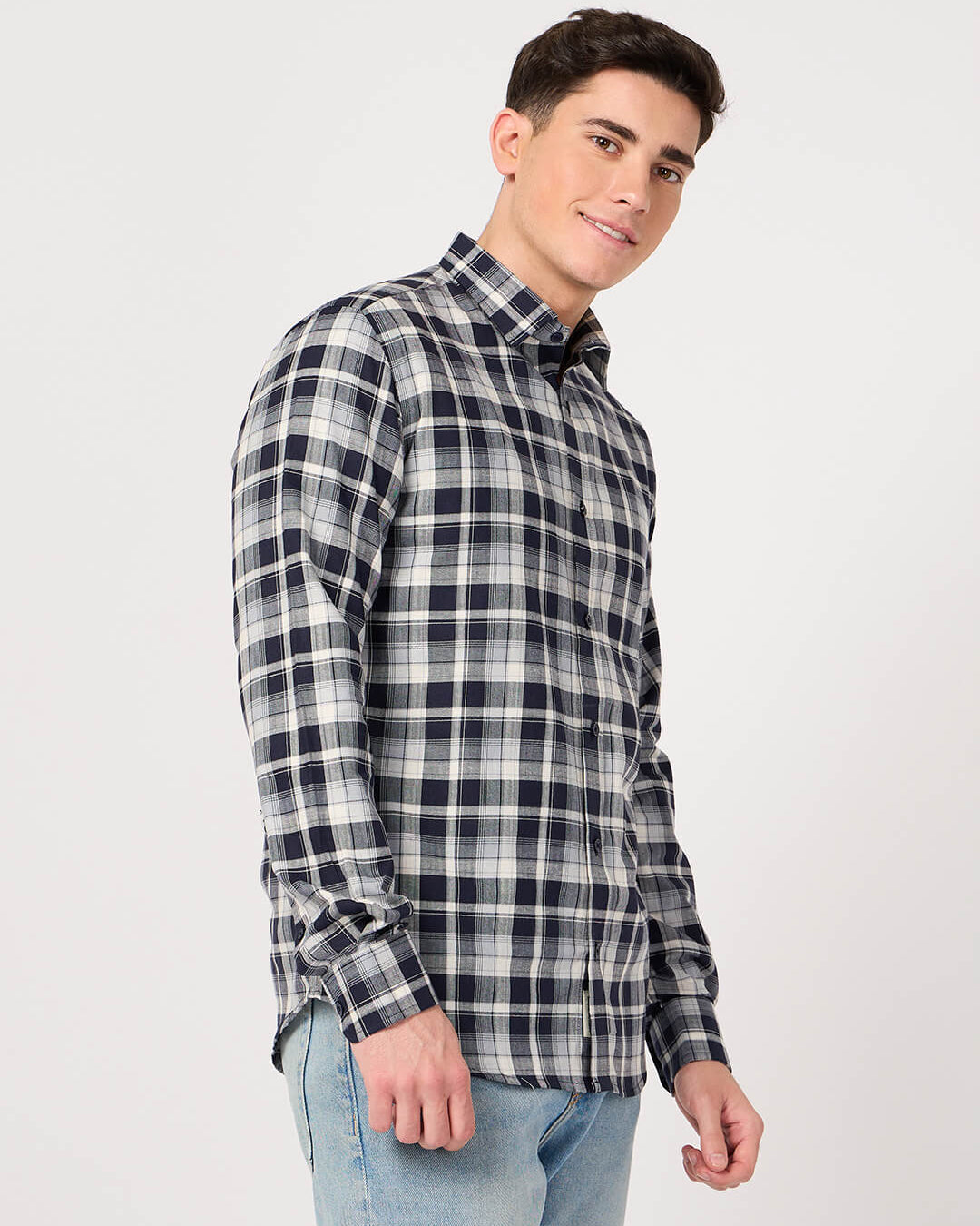 Man wearing a navy and white cotton check shirt