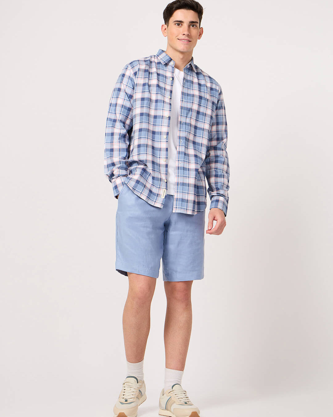 man in sky blue check shirt