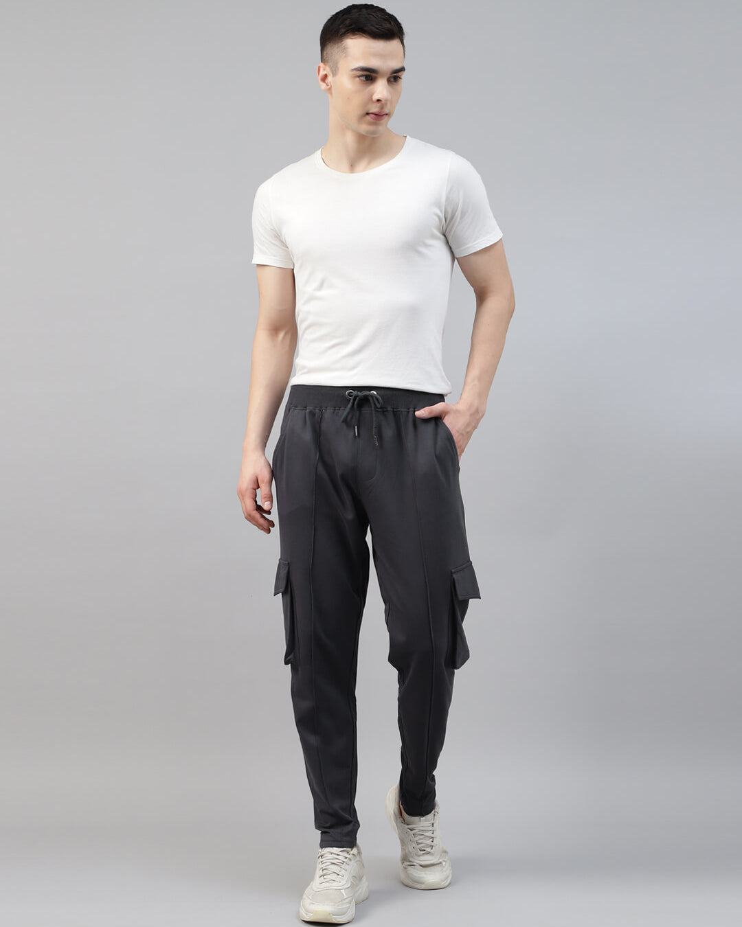 man in tshirt and grey cargo jogger pant