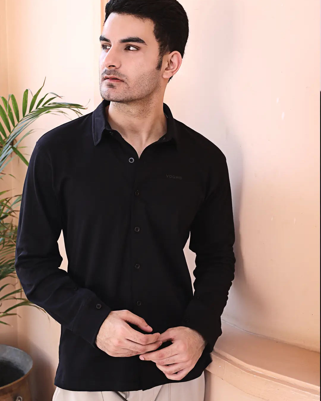 black full-sleeve cotton knit shirt