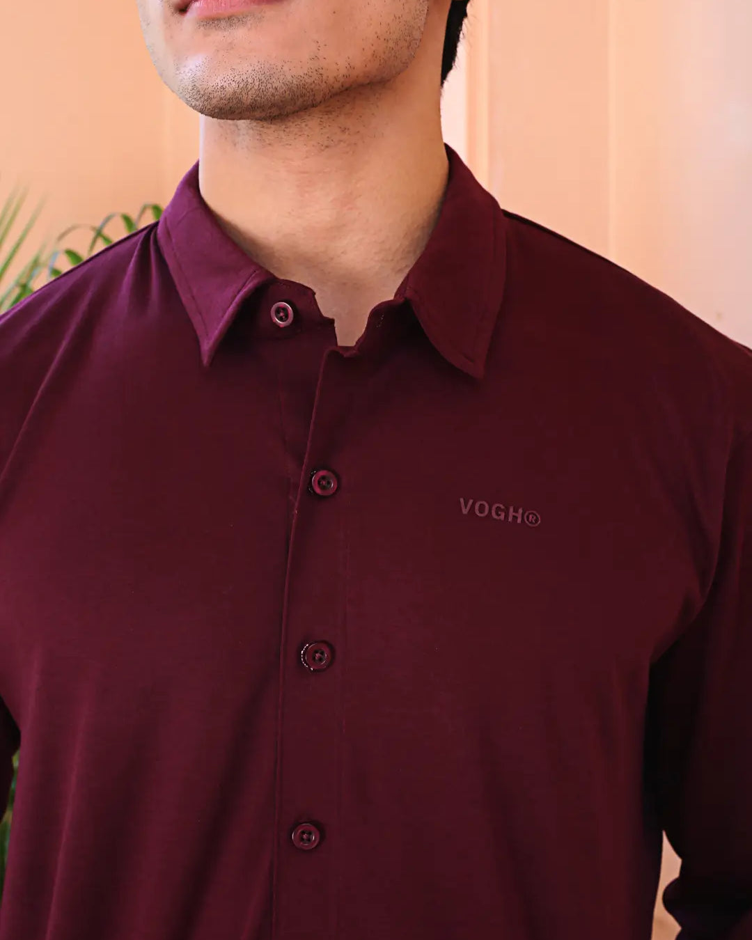 Man wearing a maroon cotton shirt