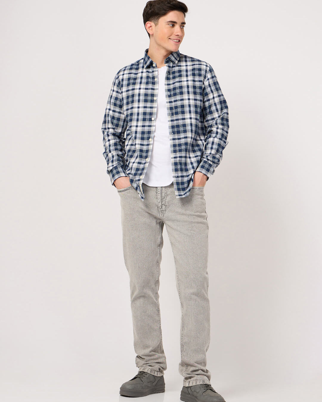 man in blue check shirt