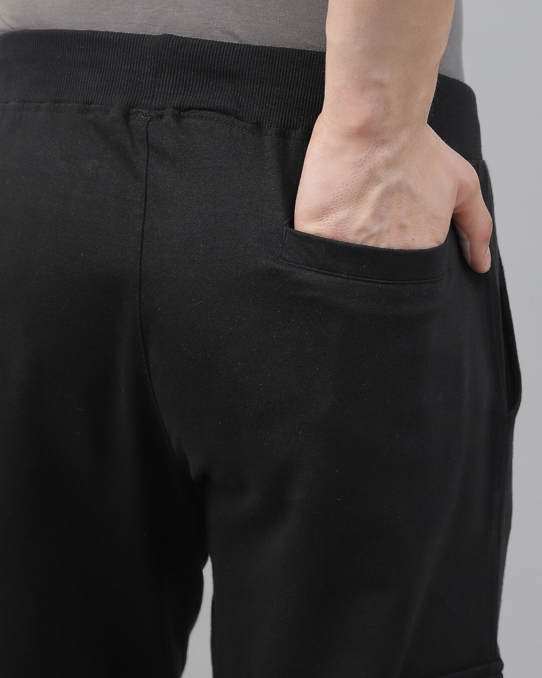 black cargo trousers showing back pocket