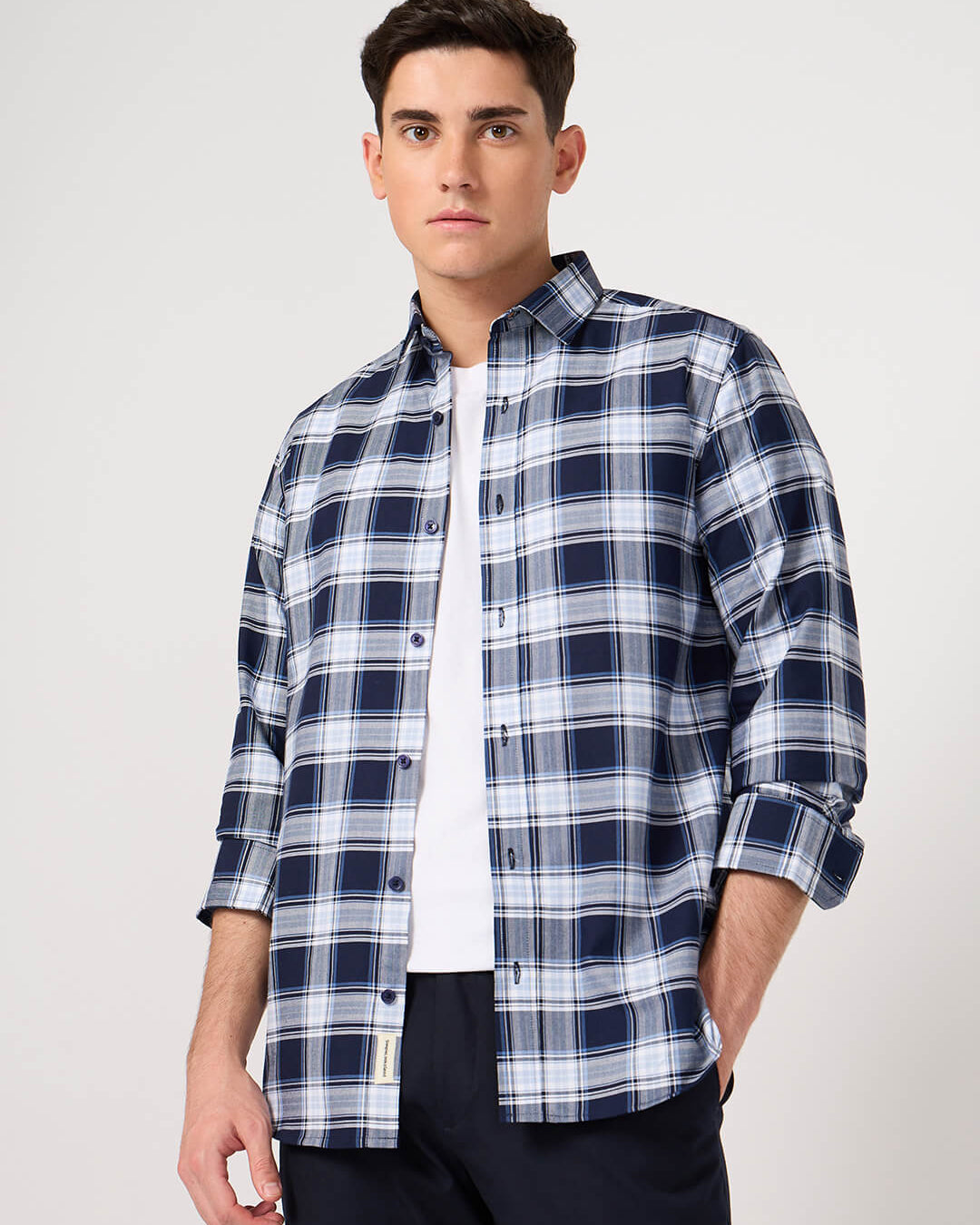 Man wearing a blue and white cotton check shirt