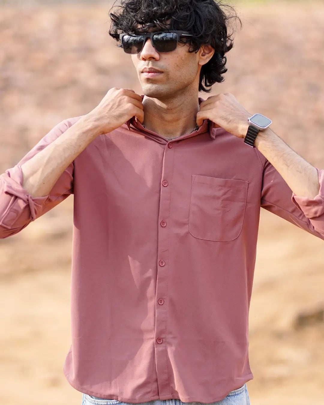 Man wearing a pink shirt