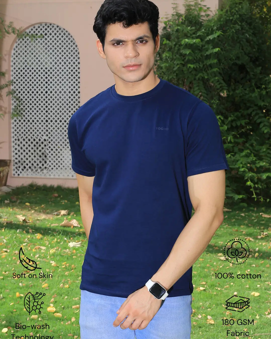 Man wearing a navy blue crew neck t-shirt