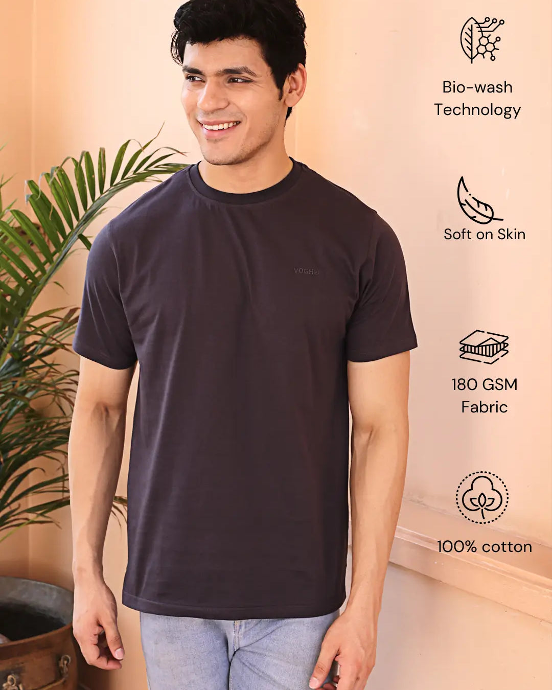 Man wearing a dark grey crew neck cotton t-shirt