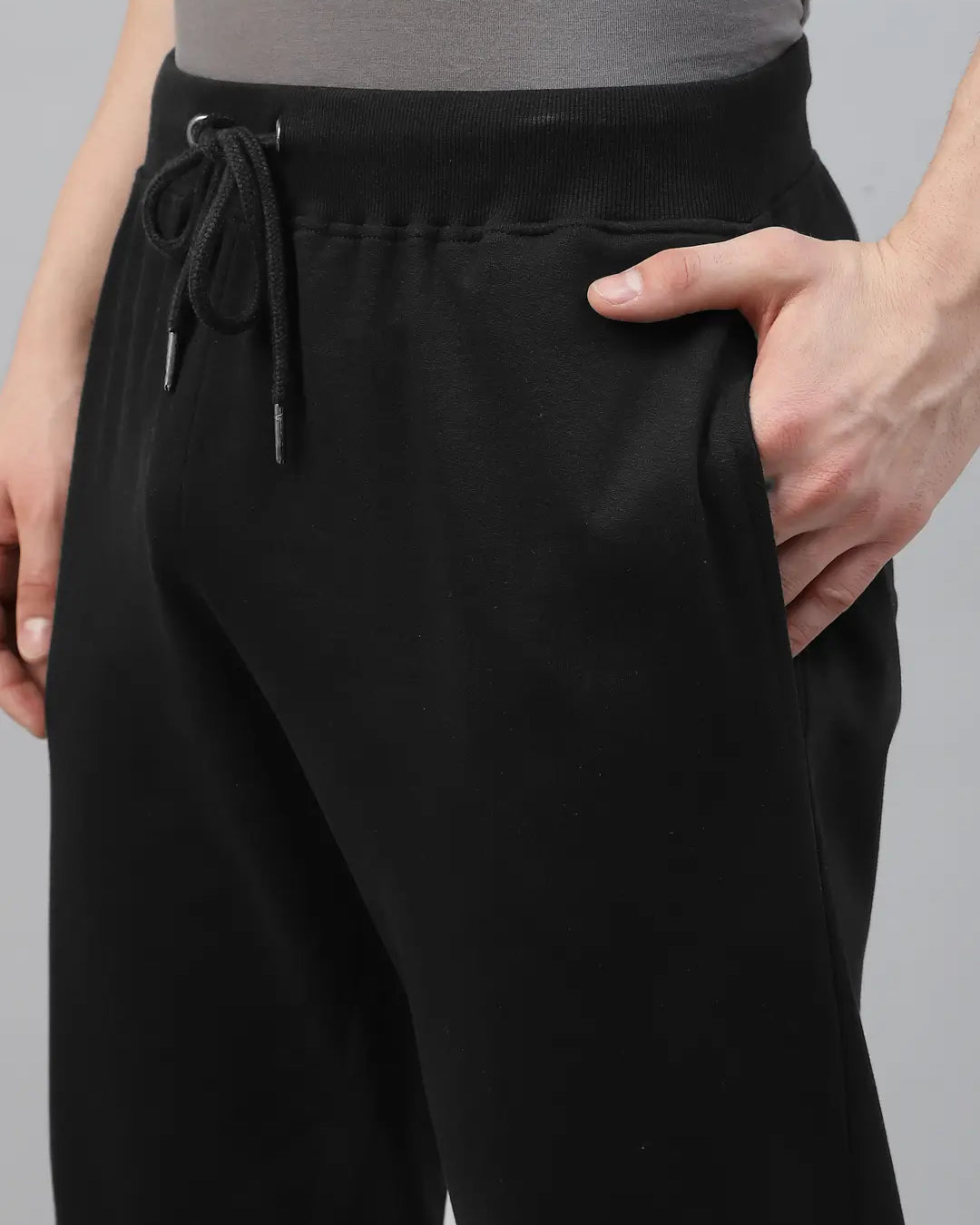 Black pants with drawstring waist worn by a person