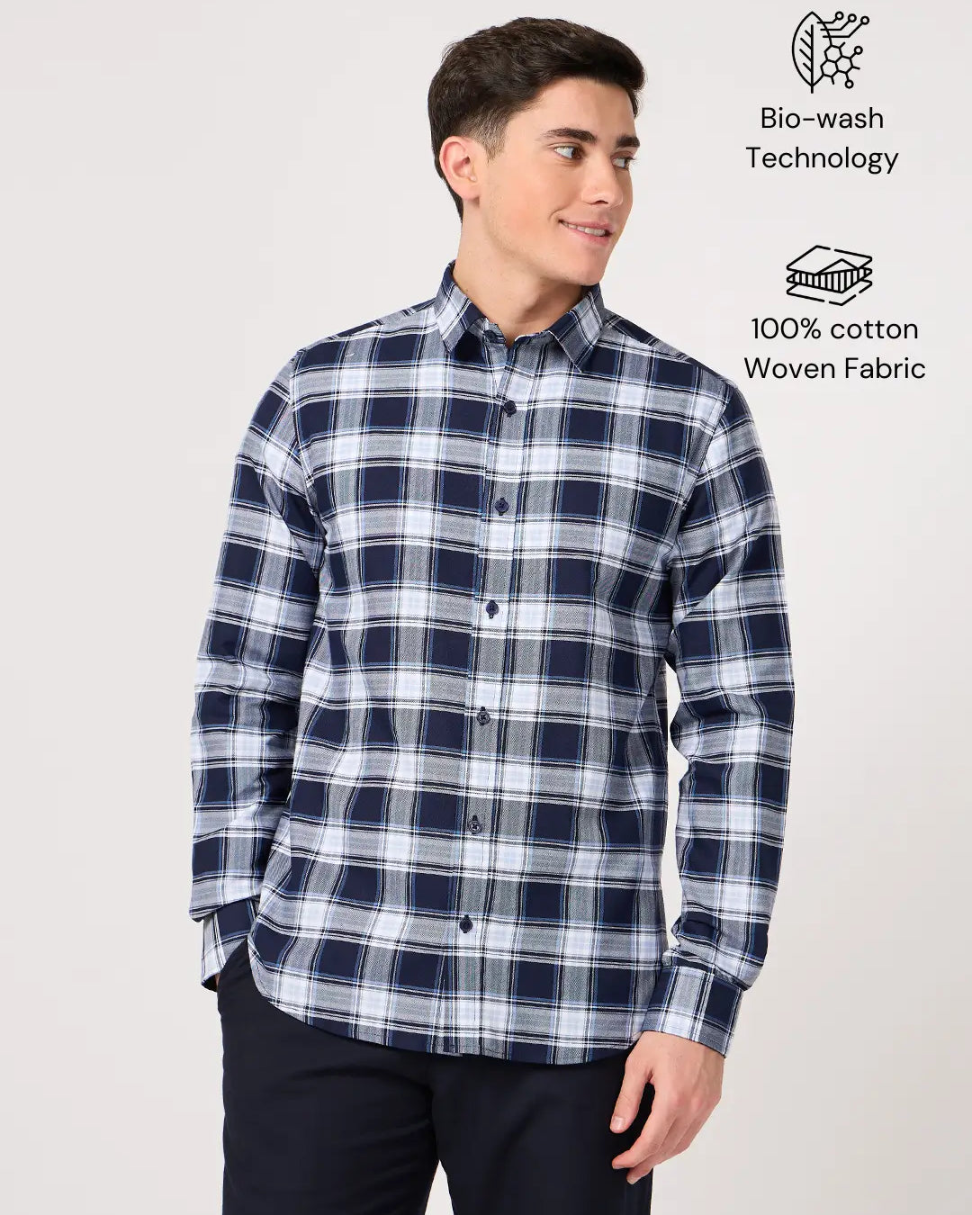 Man wearing a blue and white check shirt made with pure cotton
