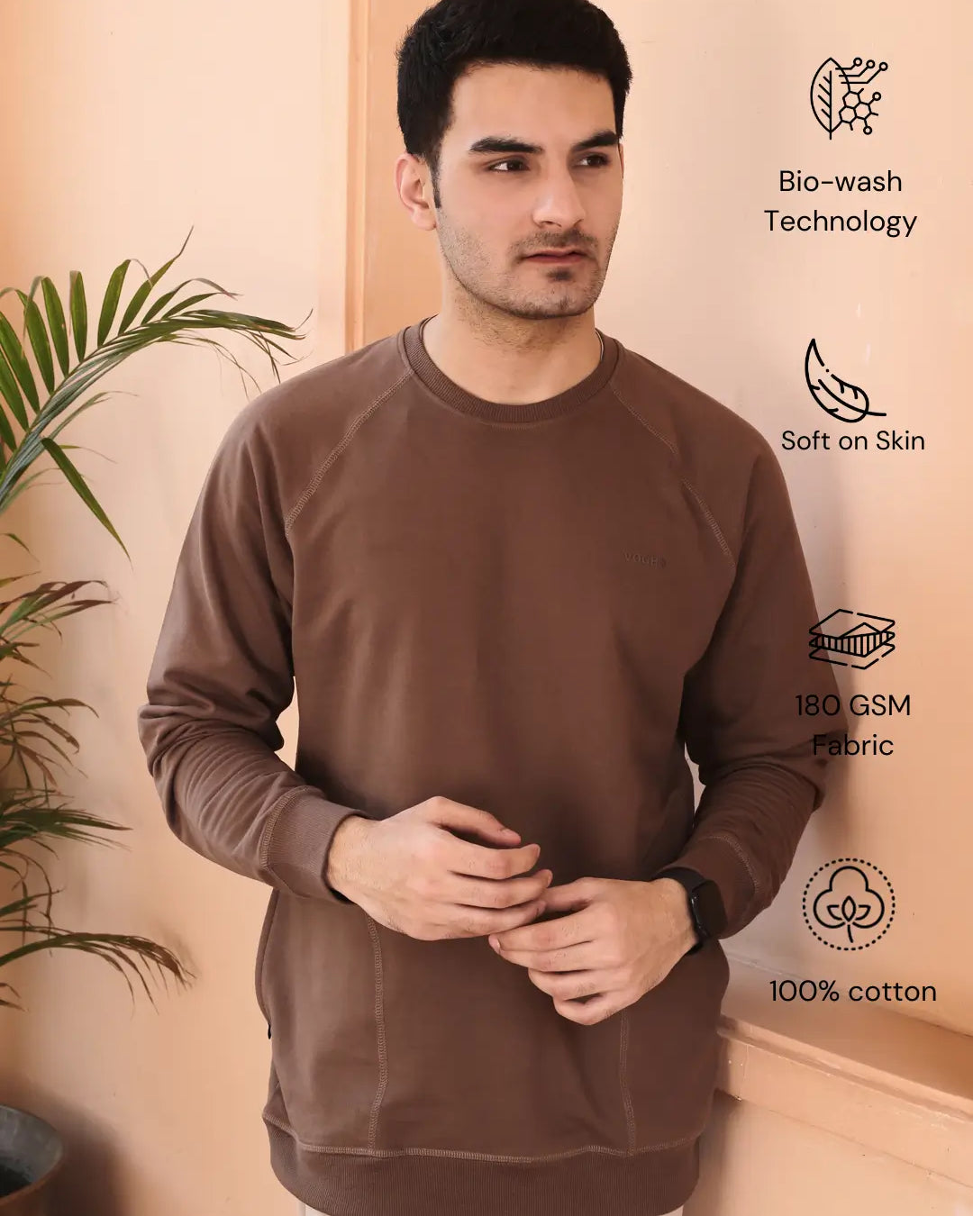 Man wearing a brown sweatshirt with pocket