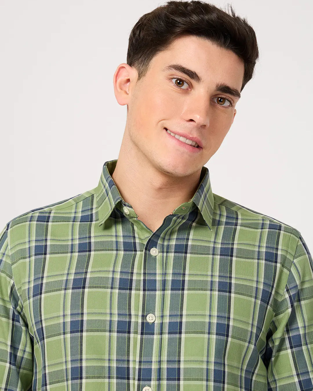 Man wearing a twill cotton green check shirt plaid shirt