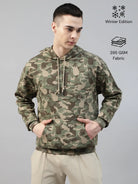 Man wearing a camouflage army hoodie