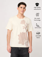 Man wearing a beige printed t-shirt made with pure cotton