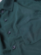 solid black blue shirt's close up