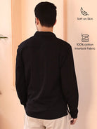 Man wearing a black cotton shirt