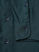 dark green shirt sleeve close up