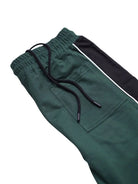 Green track pants with back pocket