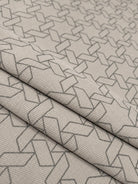 grey geometric print polo t-shirt fabric closeup