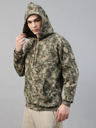 Person wearing a army print hoodie and cargo jogger