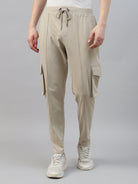 Beige cargo jogger pants worn by a person