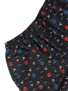 Black swim shorts with colorful nautical pattern