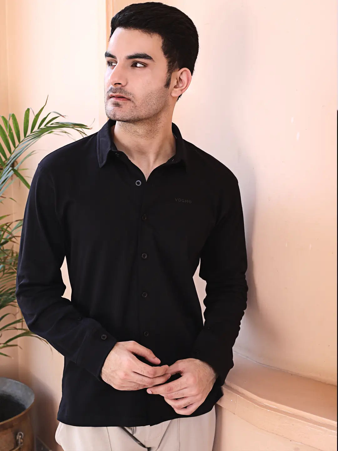 black full-sleeve cotton knit shirt