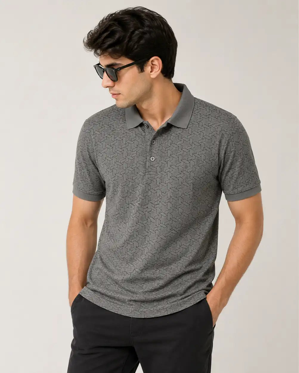 man wearing a gray polo tshirt