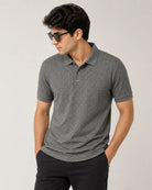 man wearing a gray polo tshirt