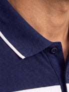 Close-up of a navy blue polo shirt