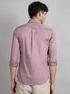 Man wearing solid satin shirt