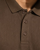 Close-up of a ribbed knit polo shirt