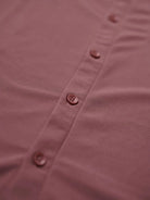 Close-up of a solid shirt with buttons