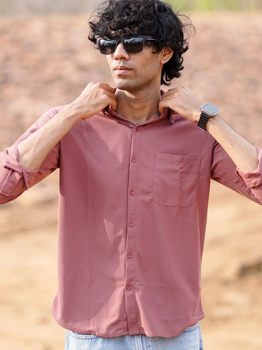 Man wearing a pink shirt