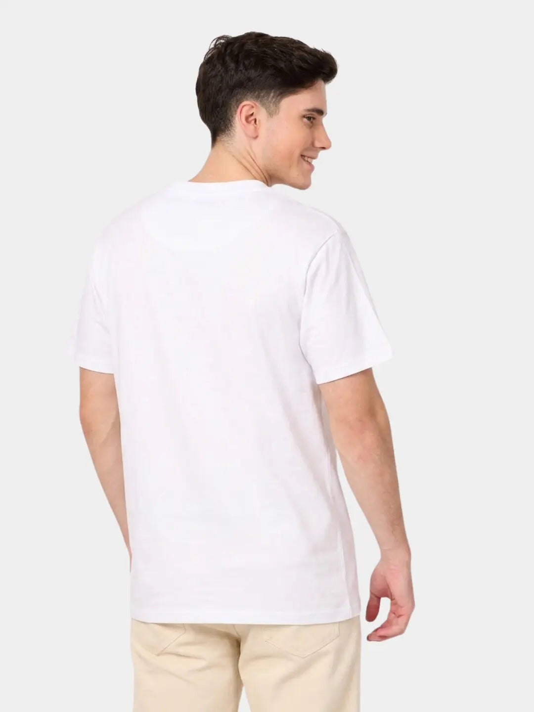 A man wearing a plain white short-sleeve t-shirt