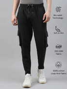 Men's cotton cargo pocket pants in black color, featuring multiple pockets and a drawstring waist.