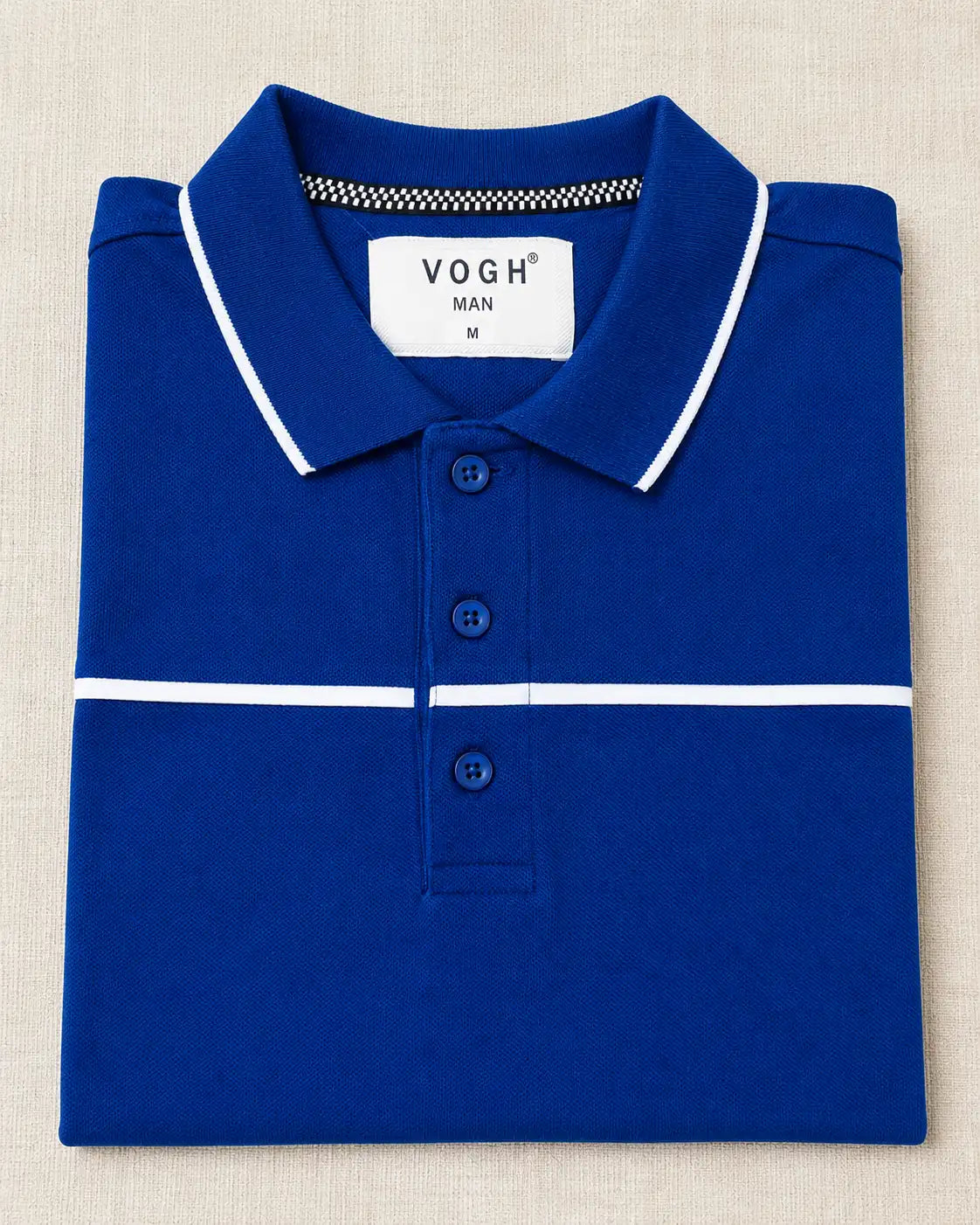 A folded blue polo t-shirt
