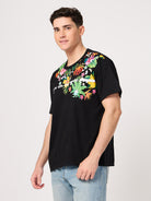 man wearing black floral printed t shirt