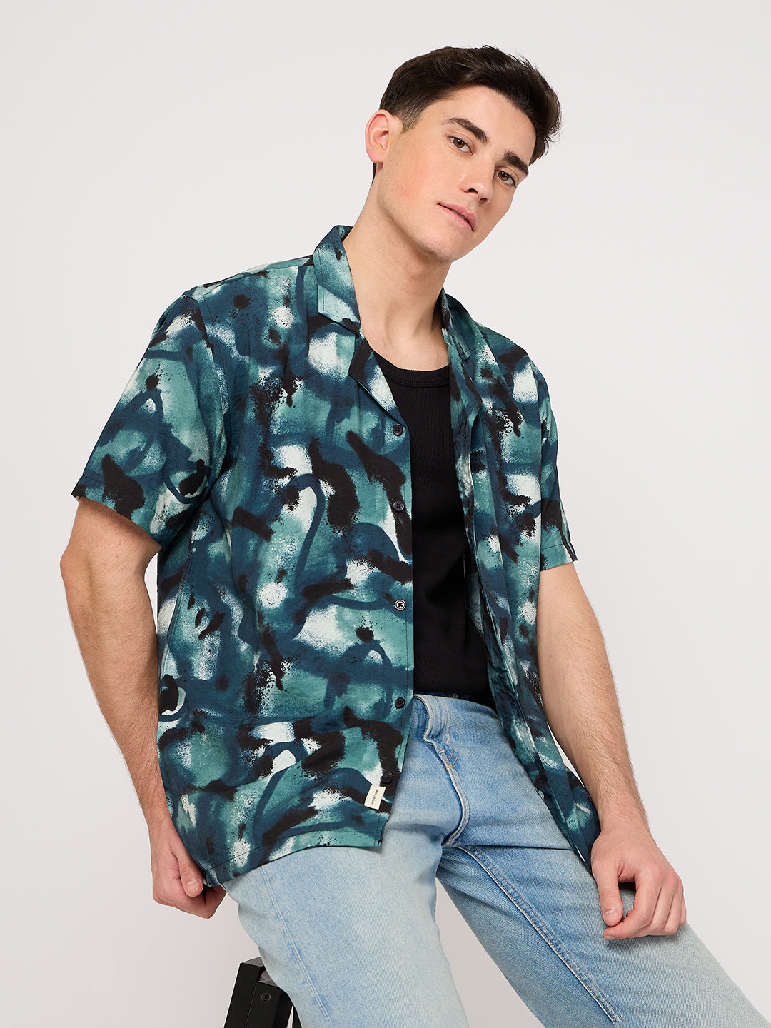 men wearing a blue print resort shirt